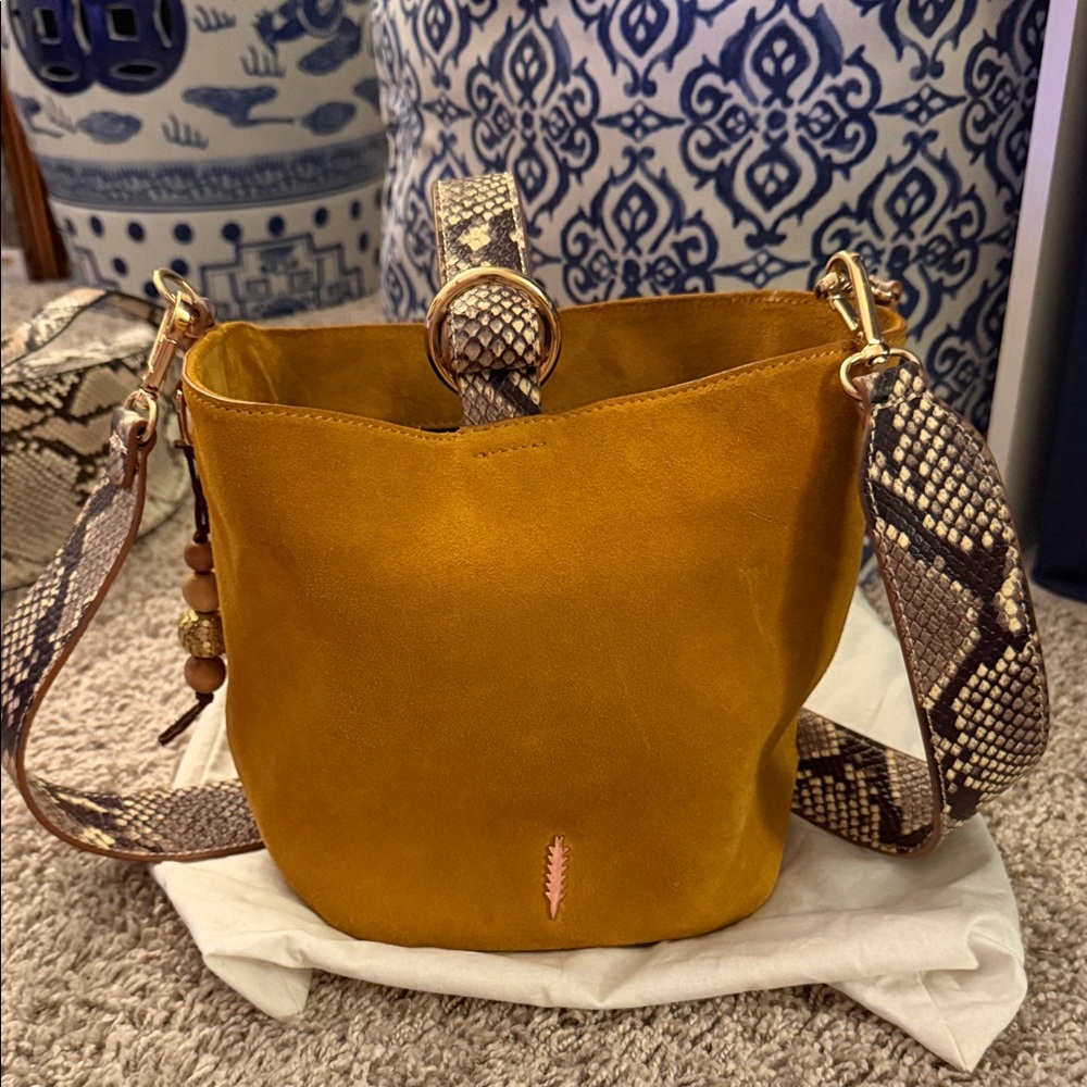 Elegant Mustard Shoulder Bag with Snake Print Strap